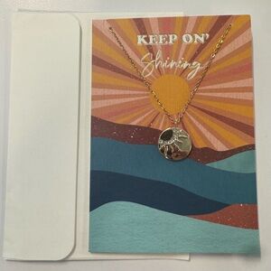 Gold Pendant Necklace with card and envelope.